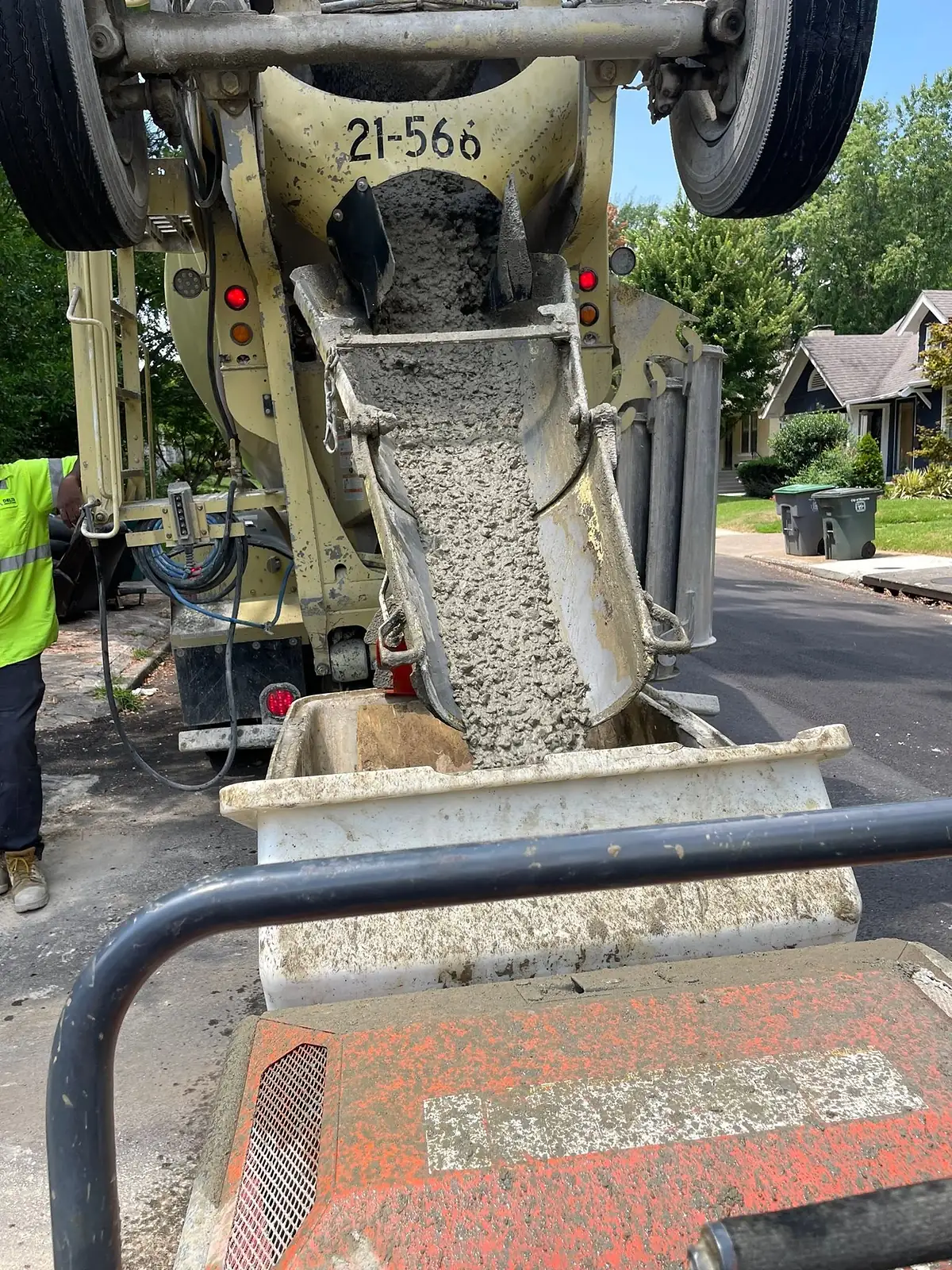 Concrete discharging from a ready mix truck drum into the chute
